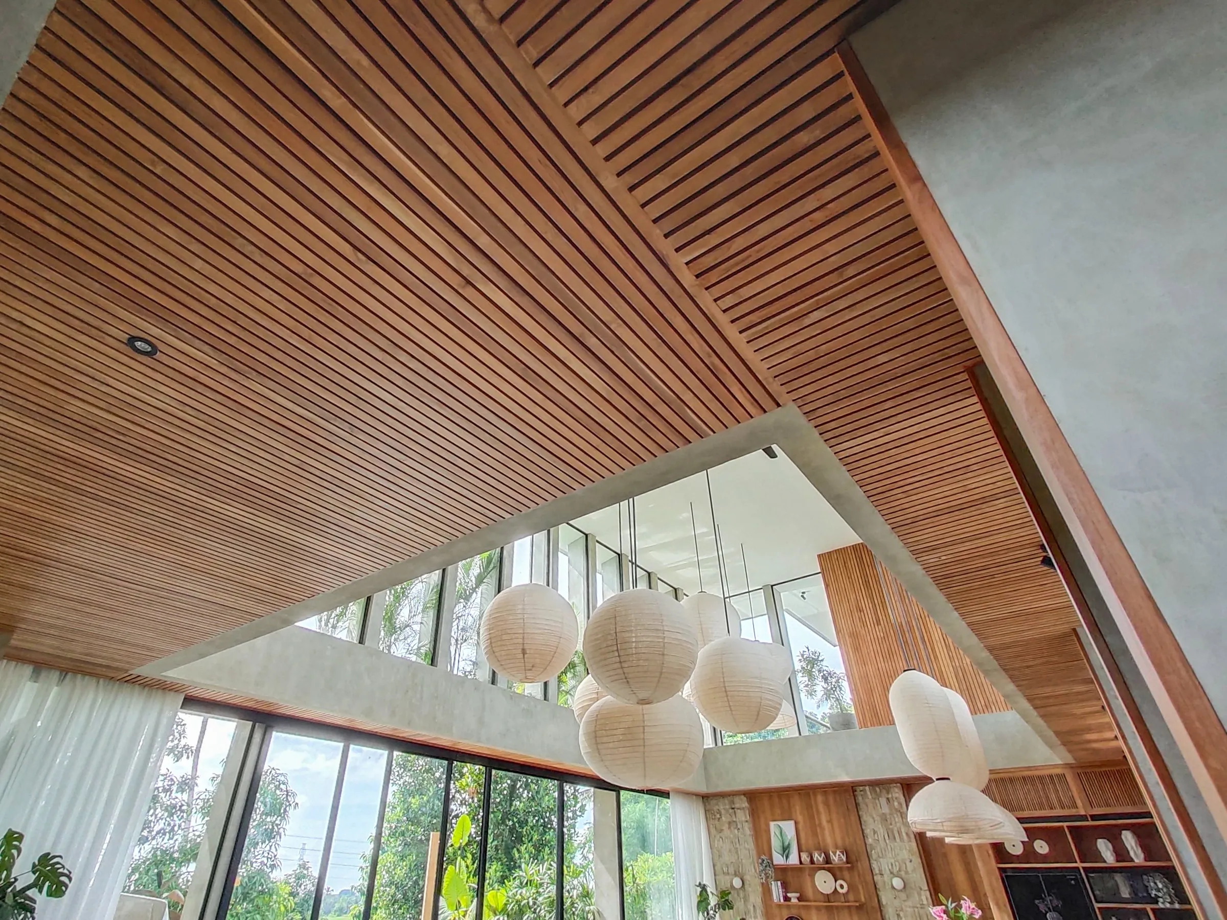 Slatted teak ceiling over the double-height living area, drawn in 3D then installed.