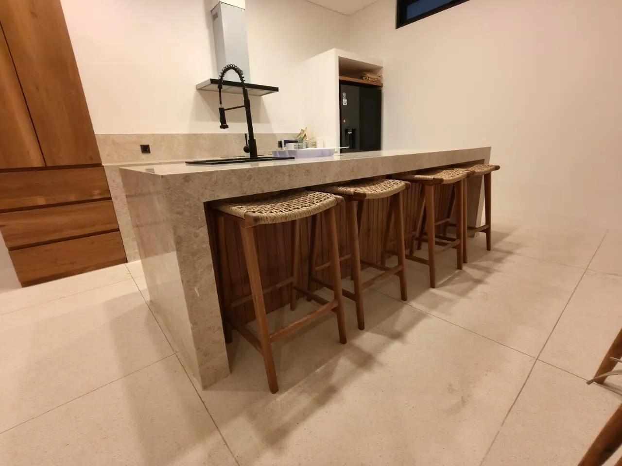 Kitchen bar with teak stools.